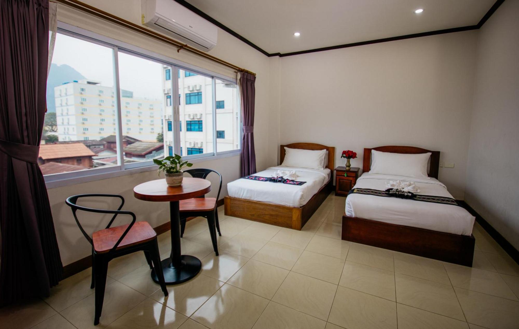 Sisombat Plaza Hotel Vangviang Kültér fotó